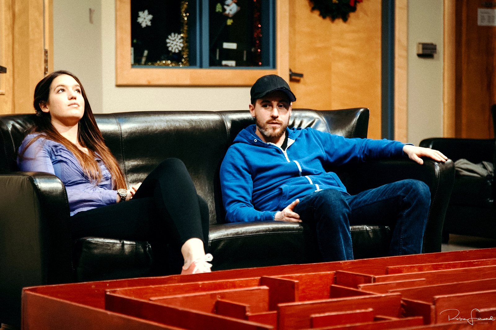 Real people, on a real set - a student cast between takes