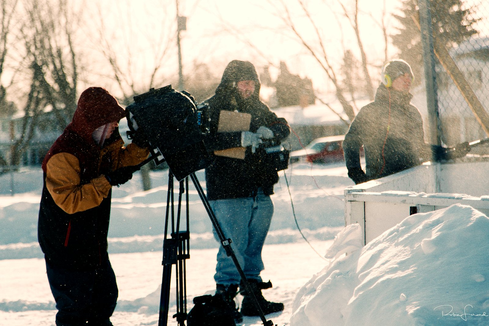 A student crew works a winter exterior